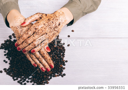 Close-up of a woman puts on hands Close-up of a woman puts on hands 33956331