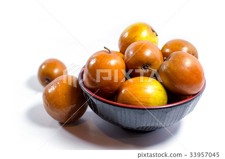 Jujube fruits close up on white background. Jujube fruits close up on white background. 33957045