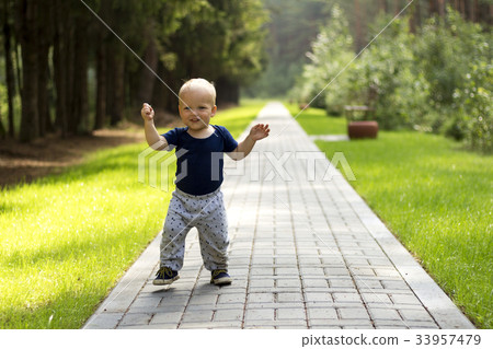 Baby's first steps.The first independent steps Baby's first steps.The first independent steps 33957479