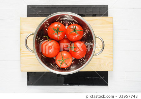 Wet Tomatoes in a Colander After Washing 33957748