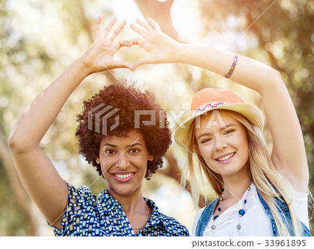 Two women friends in park 33961895