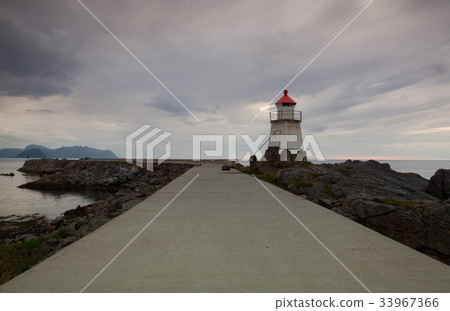 On the pier in Laukvik at sunset, Norway 33967366