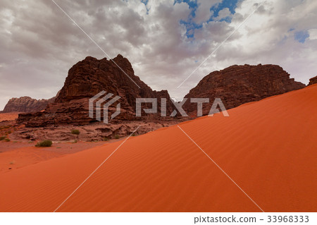 Wadi Rum Desert in Jordan at the beautiful dawn Wadi Rum Desert in Jordan at the beautiful dawn 33968333
