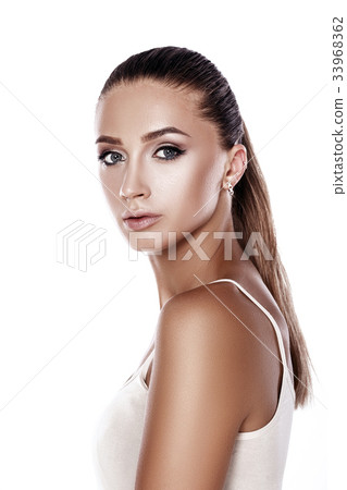 portrait of a beautiful tanned brunette woman with 33968362