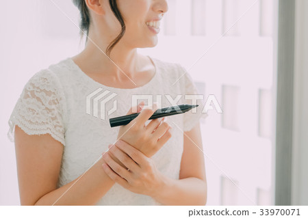 Young woman working in the office 33970071