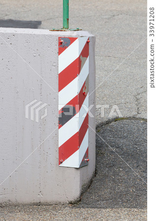 Traffic sign on a corner 33971208