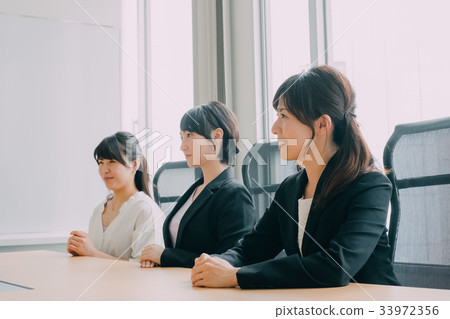 Young woman working in the office 33972356