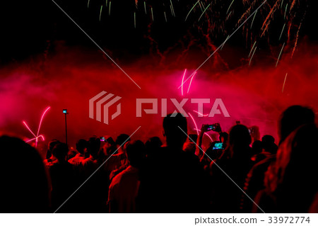 Blurred vivid background with unrecognizable Blurred vivid background with unrecognizable 33972774