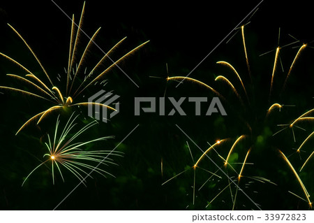 Abstract background with beautiful green fireworks 33972823