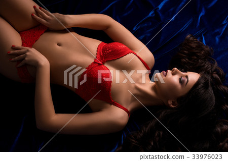 Gorgeous longhaired brunette in red underwear 33976023