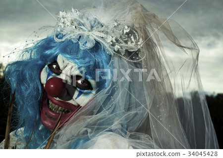 scary evil clown in a bride dress 34045428