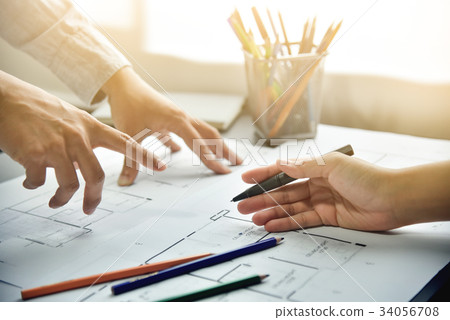 Creative Designers discussing. 34056708