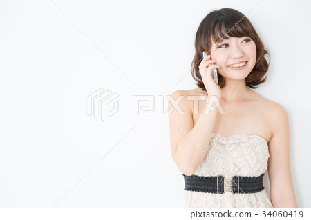 Woman using a smartphone 34060419