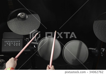 Unidentified Caucasian little girl play electronic 34062762