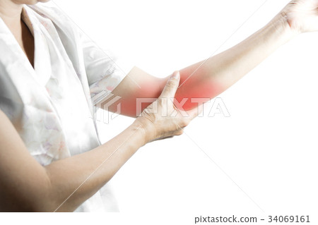 Woman touching her painful elbow. Woman touching her painful elbow. 34069161