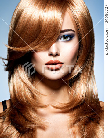 Beautiful woman with long red hairs Beautiful woman with long red hairs 34080727