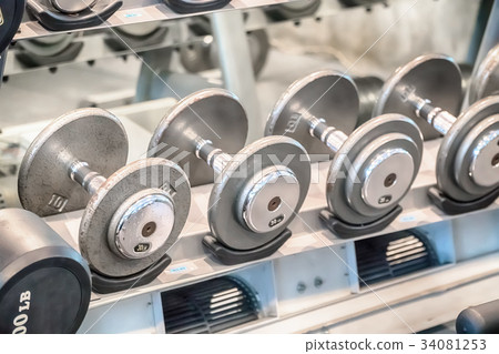 Interior of new modern gym with equipment. Interior of new modern gym with equipment. 34081253