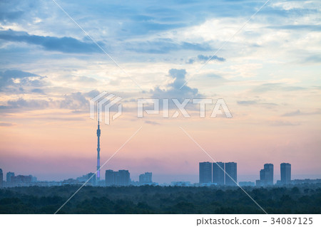 blue and pink sunrise sky over Moscow city 34087125