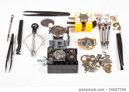 watch repairing tools on white 34087590
