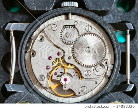 used watch fixed in plastic holder for repairing used watch fixed in plastic holder for repairing 34088326