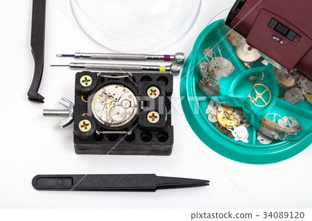 tools with head-mounted magnifier close up 34089120