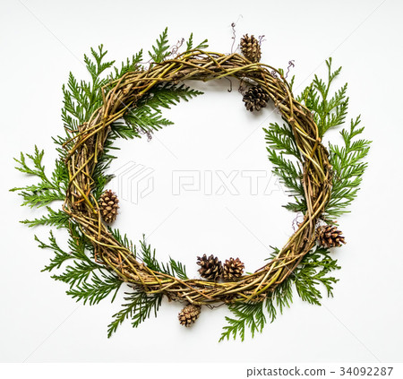 Festive wreath with branches and cones. Flat lay Festive wreath with branches and cones. Flat lay 34092287