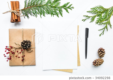 Gift box and letter on white. Christmas flat lay 34092298