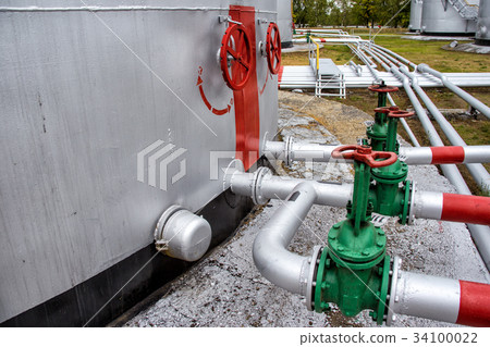 Large oil tank with valves and pipings 34100022