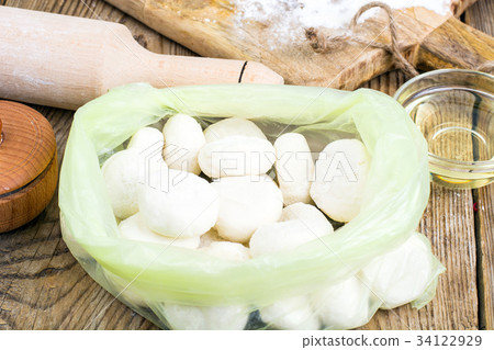 Small flour cookies on wooden board 34122929
