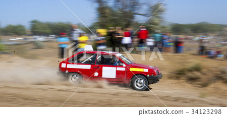 Rally car on a racing track Rally car on a racing track 34123298