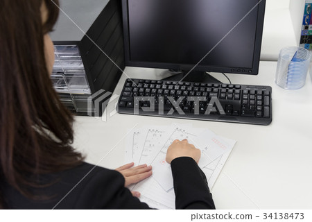 Hiring person checking resume Hiring person checking resume 34138473