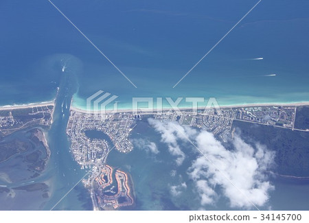 Overlooking the sandbanks of Coon Island, Causeway Island, across the Fort Pierce Channel facing the Atlantic Ocean in Florida, USA 34145700