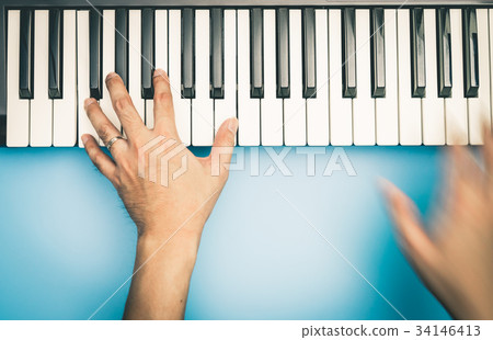 Fast hand Music keyboard player 34146413