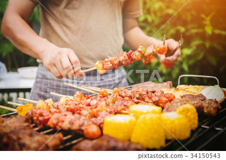 Family holiday vacation barbecue party. 34150543
