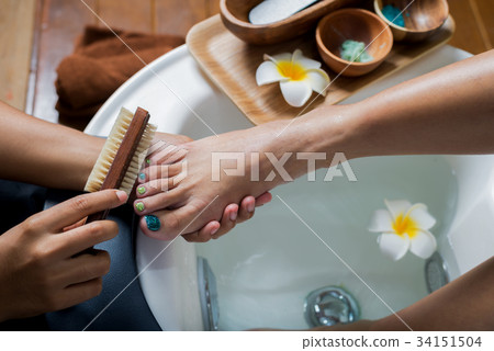 Pedicure series: Brushing customer 34151504