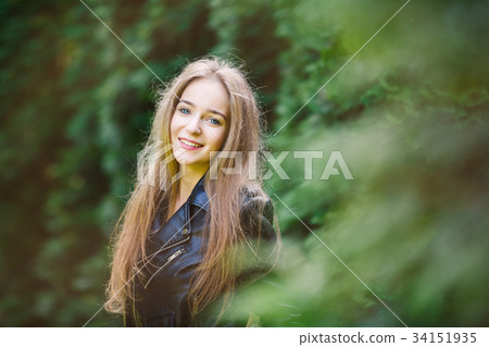 Portrait of the happy young girl Portrait of the happy young girl 34151935