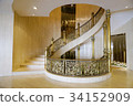 Luxury hotel marble spiral staircase 34152909