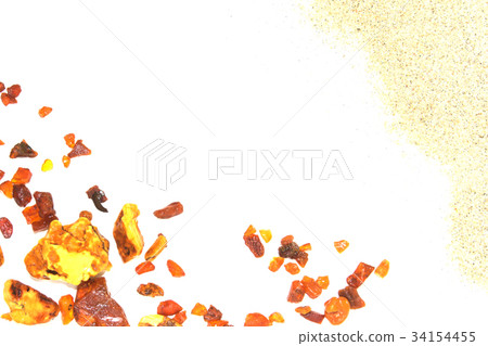 Eight different pieces of amber on a white 34154455