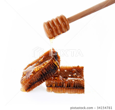 Honeycomb , spoon wood on white background 34154781
