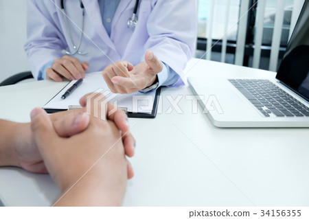 Doctor and patient are discussing something, Doctor and patient are discussing something, 34156355