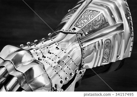 Medieval armor, detail of an ancient armor. Steel 34157495