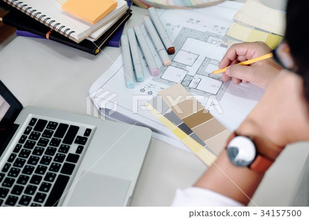 Architect interior selects color for house Architect interior selects color for house 34157500