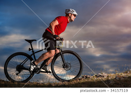 Bike adventure travel photo. Bike tourists ride on Bike adventure travel photo. Bike tourists ride on 34157519