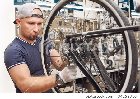 Repair technician bicycles was repaired gear bike Repair technician bicycles was repaired gear bike 34158316