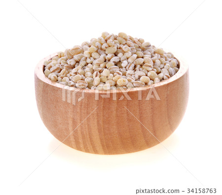 barley grain seed on wooden bowl background barley grain seed on wooden bowl background 34158763