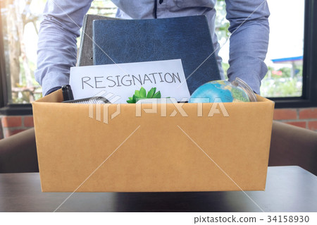 businessman carrying packing up all his personal belongings and 34158930
