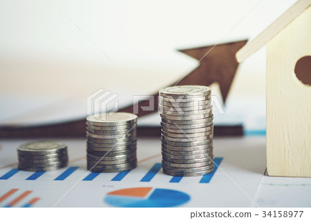financial banking stock spreadsheet with stack of coin, house an financial banking stock spreadsheet with stack of coin, house an 34158977