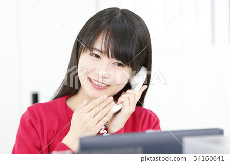 Bright woman working in office Bright woman working in office 34160641