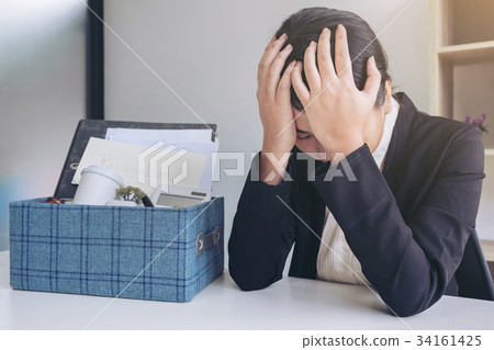 Images of packing up all her personal belongings and files into 34161425