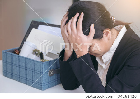 Images of packing up all her personal belongings and files into 34161426